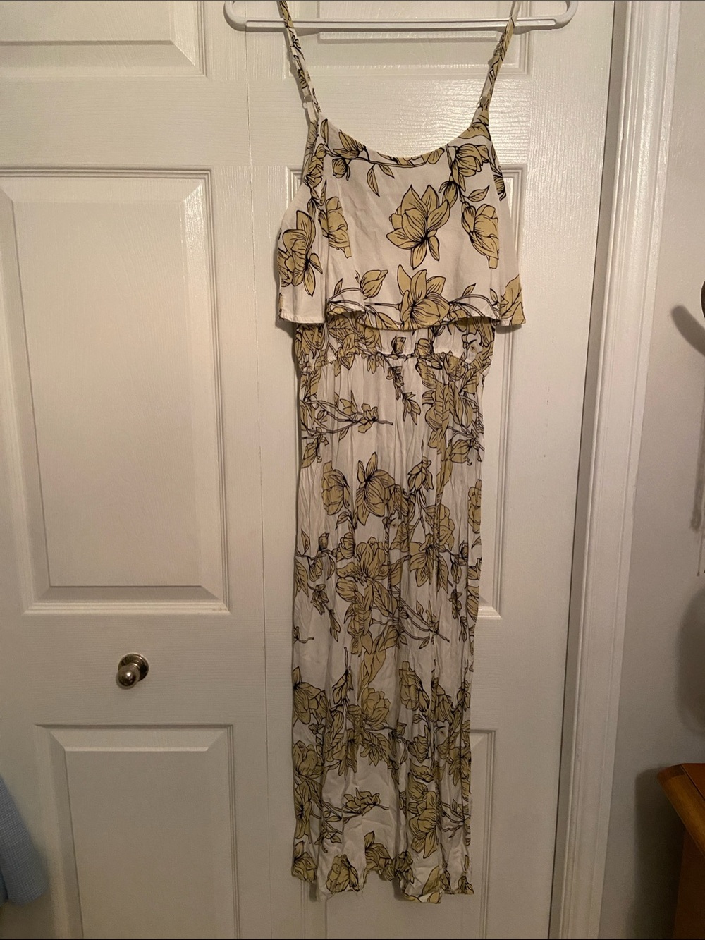 Flowery summer dress spaghetti strap (adjustable) with flowy layer on top half.